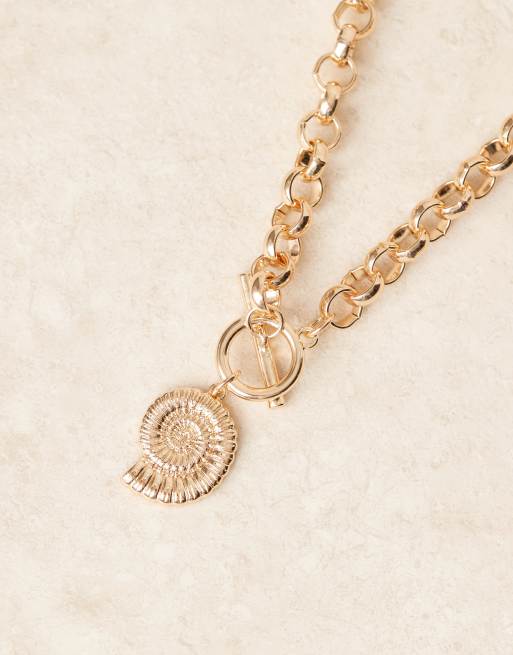 ASOS DESIGN necklace with t bar and shell charm details in gold tone, 2 of 3