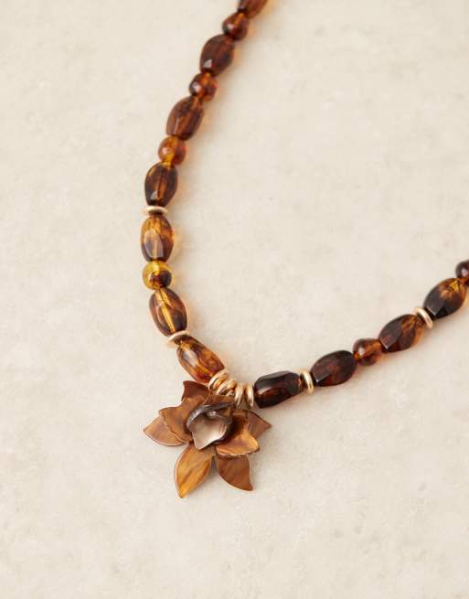 ASOS DESIGN necklace with tortoise shell beads and pendant ASOS