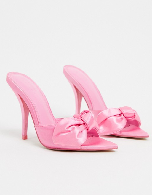 ASOS DESIGN Nester bow mules sandals on pointed insole in pink