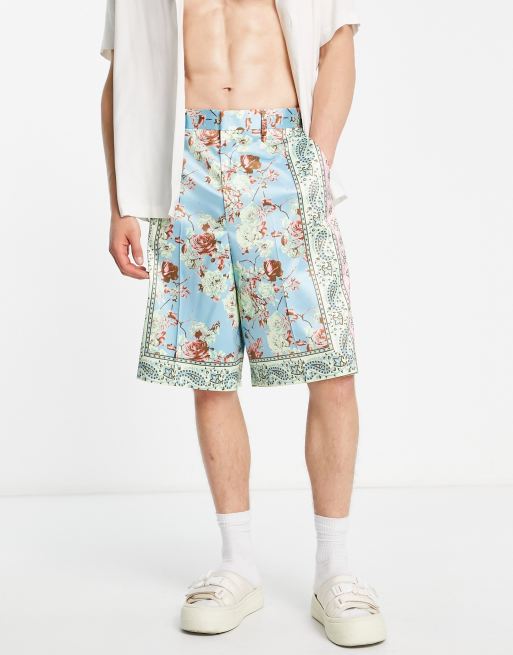 ASOS DESIGN - Nette bermudashort in blauw met roze randprint