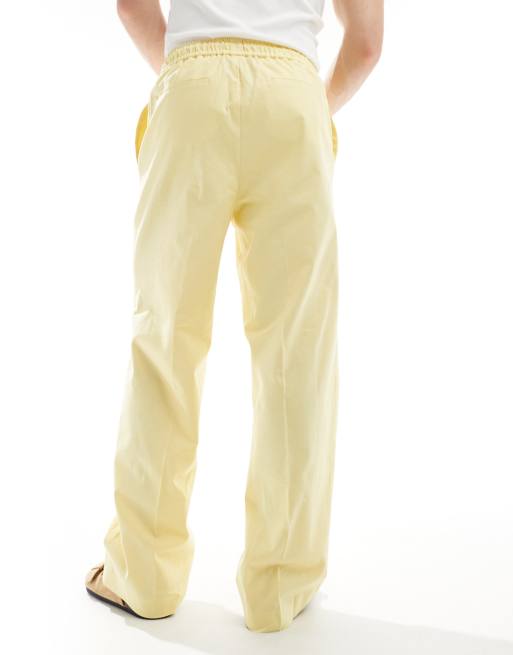 ASOS DESIGN - Nette broek van linnenmix met wijde pijpen en elastische taille in stoffig geel, 4 van 5