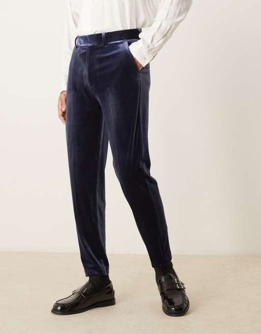 ASOS DESIGN - Nette fluwelen broek met toelopende pasvorm in marineblauw