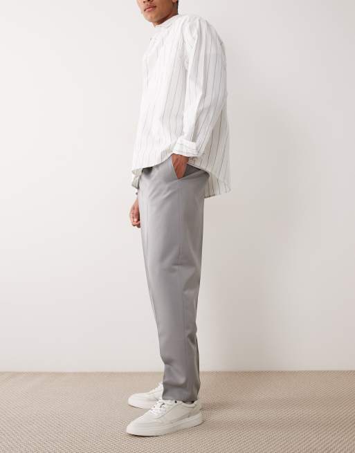 ASOS DESIGN - Nette geplooide ruimvallende toelopende broek in grijs, 3 van 5
