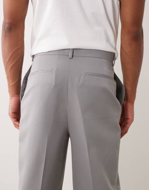 ASOS DESIGN - Nette geplooide ruimvallende toelopende broek in grijs, 4 van 5