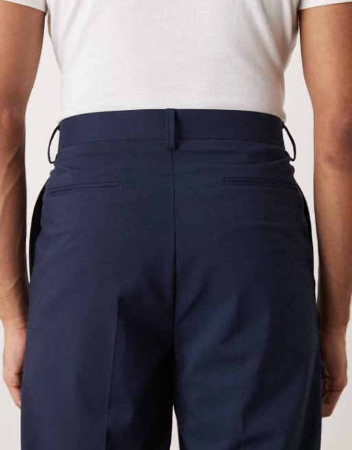 ASOS DESIGN - Nette geplooide ruimvallende toelopende broek in marineblauw, 5 van 5