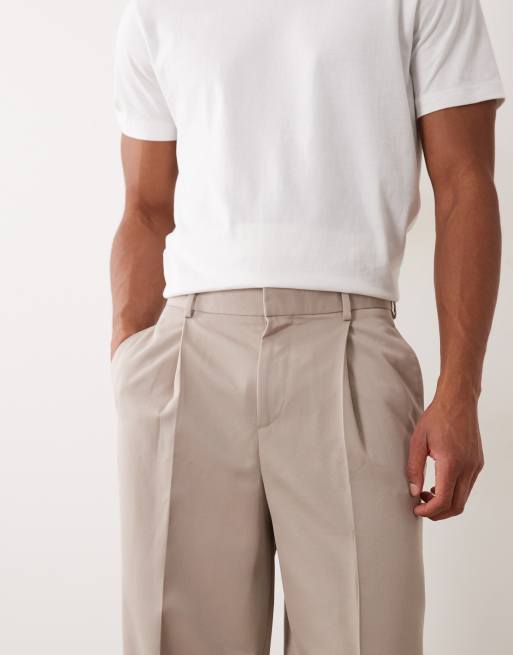 ASOS DESIGN - Nette geplooide ruimvallende toelopende broek in stone, 2 van 5