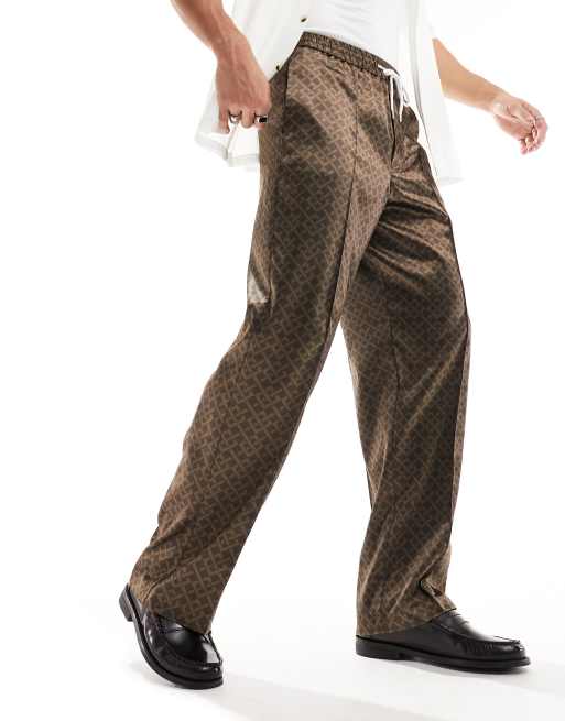 ASOS DESIGN - Nette joggingbroek met wijde pijpen en geometrische print in bruin