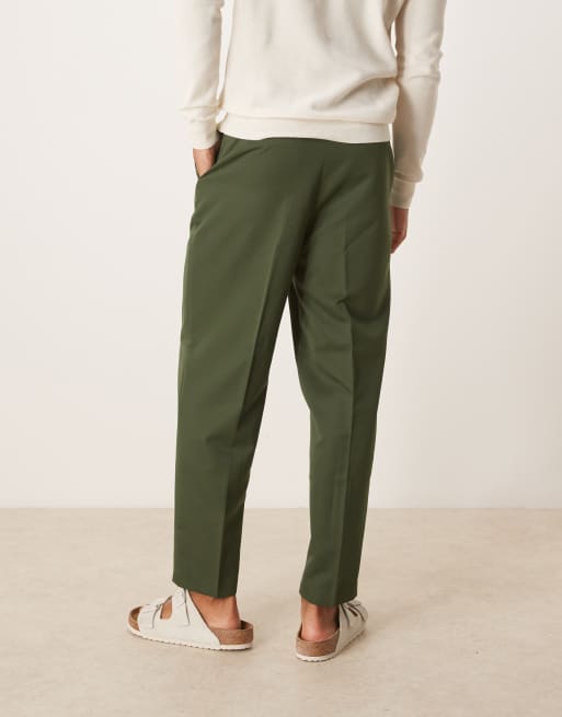 ASOS DESIGN - Nette ruimvallende broek met toelopende pasvorm in donkergroen, 4 van 5