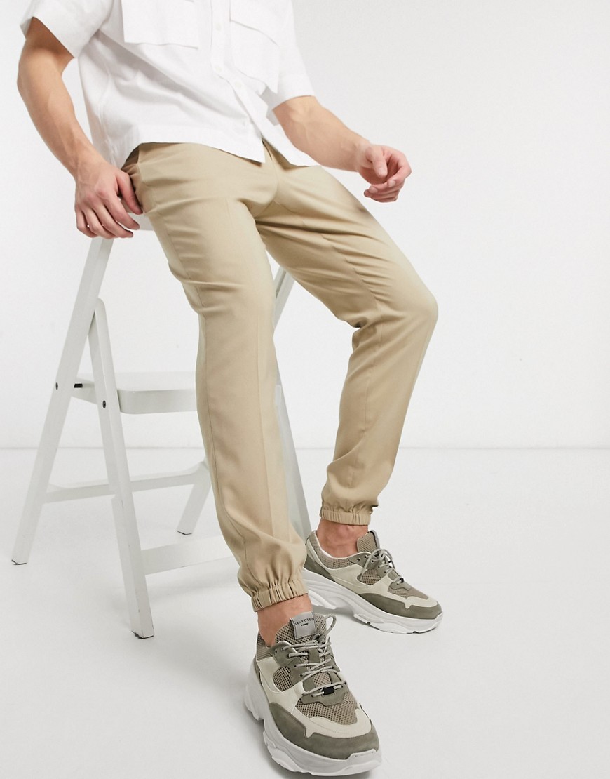 ASOS DESIGN - Nette skinny broek met boorden in jogging-stijl in kiezelkleur-Kiezelkleurig