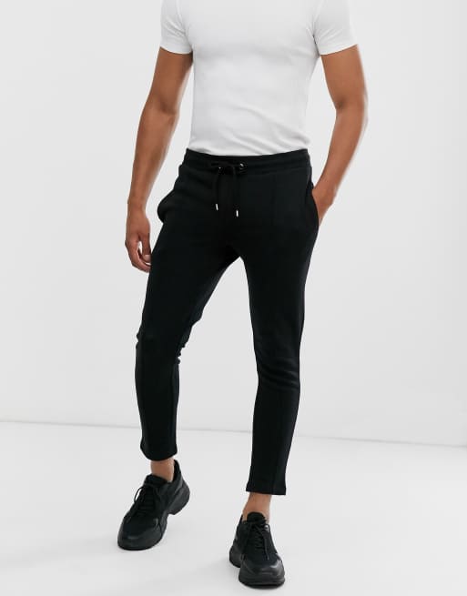 ASOS DESIGN - Nette skinny joggingbroek met geplooide voorkant in zwart