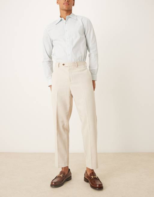 ASOS DESIGN - Nette smaltoelopende ruimvallende broek van wolmix in crème, 2 van 5