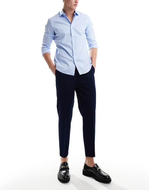 ASOS DESIGN - Nette toelopende broek in donkerblauw