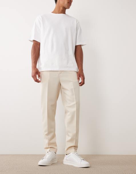 ASOS DESIGN - Nette toelopende broek met elastische taille en omslag in ecru - view 1