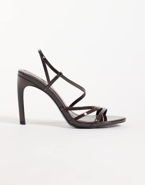 ASOS DESIGN Neverland asymmetric strappy high sandals in chocolate patent - view 1