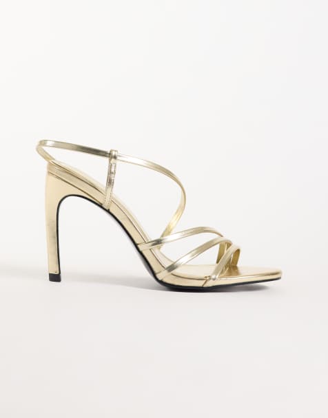 ASOS DESIGN Neverland asymmetric strappy high sandals in gold - view 1