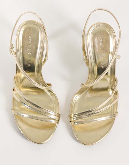 ASOS DESIGN Neverland asymmetric strappy high sandals in gold, 2 of 4