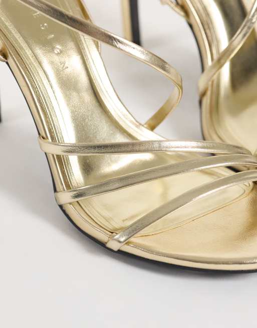 ASOS DESIGN Neverland asymmetric strappy high sandals in gold, 4 of 4