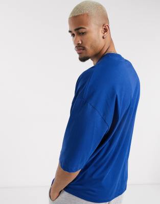 ASOS DESIGN Tall oversized long sleeve T-shirt NFL New York Giants in blue