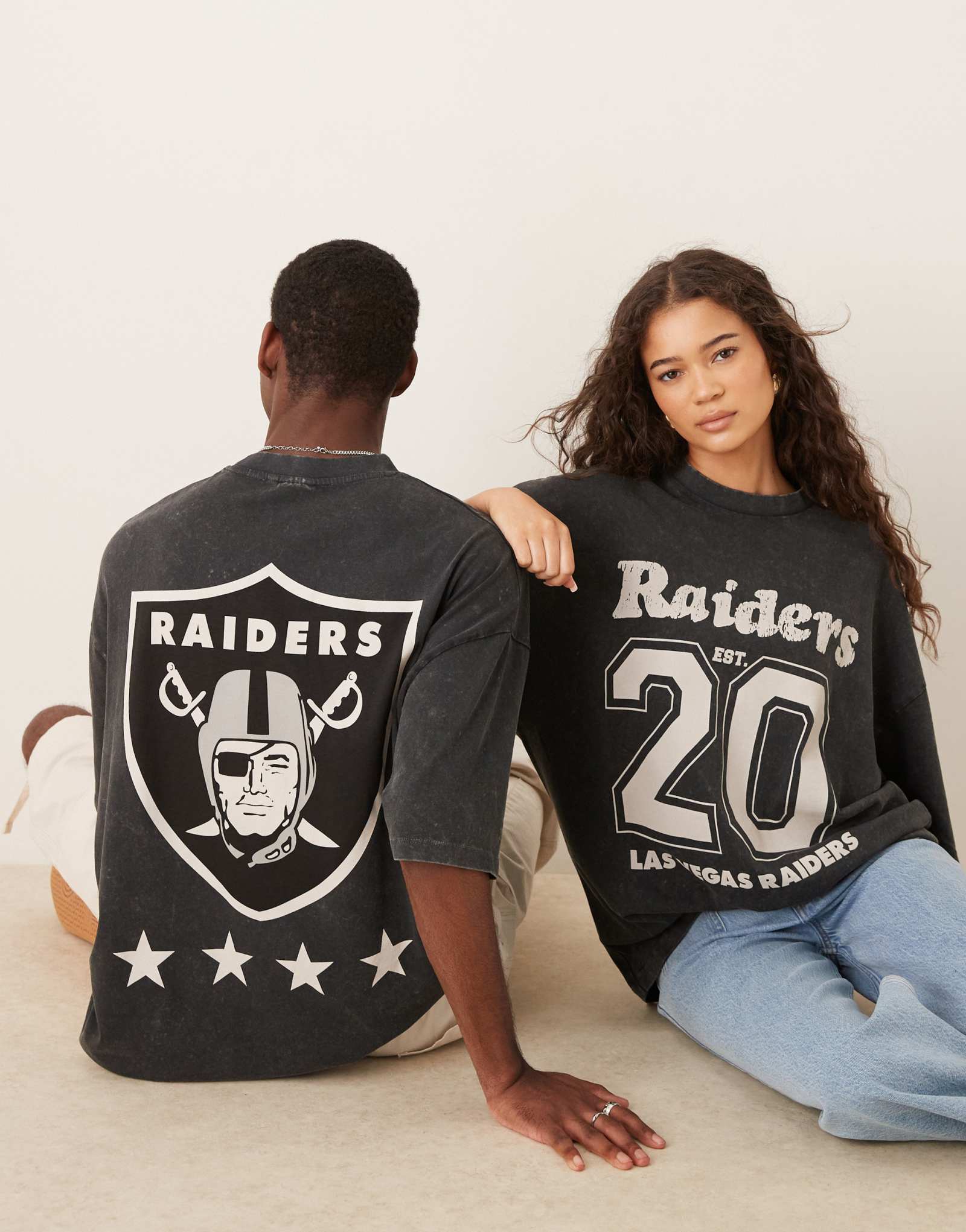 Футболка ASOS DESIGN NFL унисекс оверсайз с принтом Raiders черного цвета, выполненная в стираном стиле