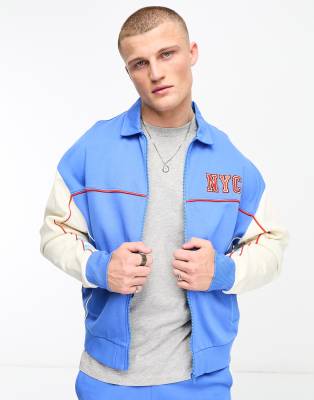 ASOS DESIGN – Niebieska dżersejowa kurtka bomberka oversize w uczelnianym stylu, część zestawu