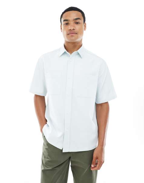 ASOS DESIGN relaxed shirt with patch pockets in blue