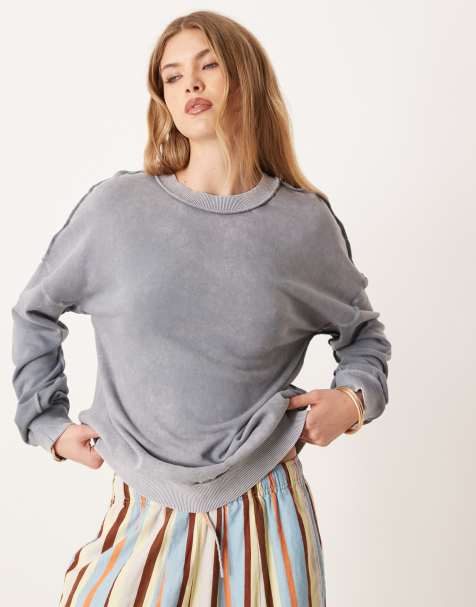 ASOS DESIGN exposed seam brushback twist back sweat in washed blue