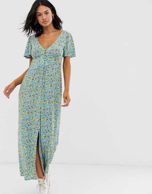 ASOS DESIGN - Niebieska sukienka maxi w kwiatki z krepowanego dżerseju z guzikami o wzorze i kolorze takim, jak reszta sukienki,