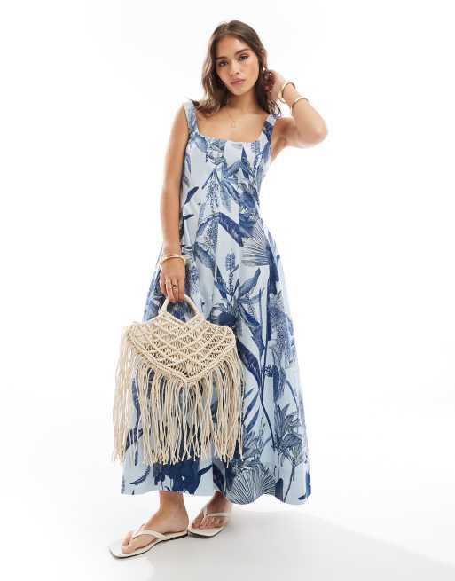 ASOS DESIGN – Niebieska sukienka tenisowa maxi z ozdobnymi szwami w tropikalny wzór