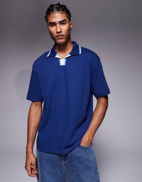 ASOS DESIGN relaxed textured polo with contrast collar in blue