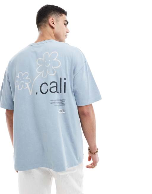 ASOS DESIGN – Niebieski T-shirt oversize z efektem sprania, nadrukiem z motywem kwiatów i napisem „California” na plecach