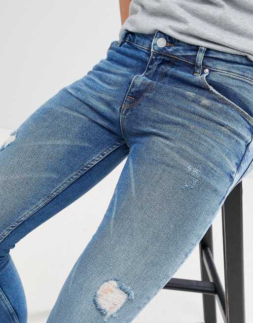 ASOS DESIGN – Niebieskie bardzo obcisłe jeansy z efektem sprania, z przetarciami, 3 z 4