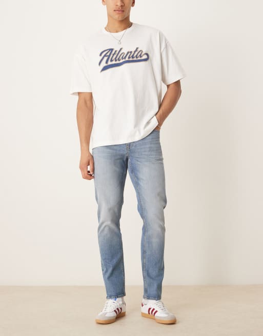 ASOS DESIGN – Niebieskie dopasowane jeansy w stylu vintage