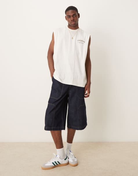 ASOS DESIGN longer length denim jort in mid wash blue