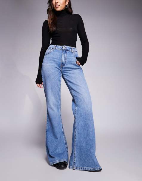 ASOS DESIGN relaxed flare jean in mid blue