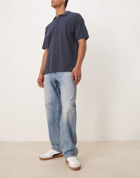 ASOS DESIGN baggy fit jeans in mid wash blue