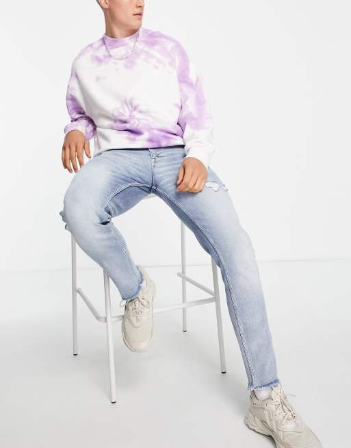ASOS DESIGN – Niebieskie jeansy o obcisłym kroju z przetarciami i surowym wykończeniem
