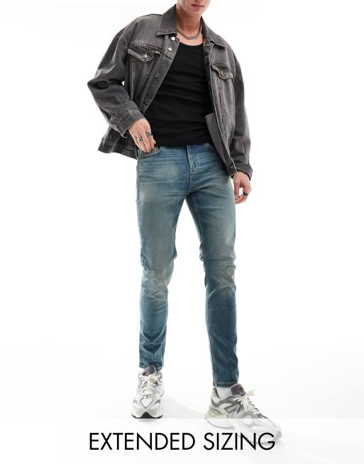 ASOS DESIGN – Niebieskie jeansy o obcisłym kroju