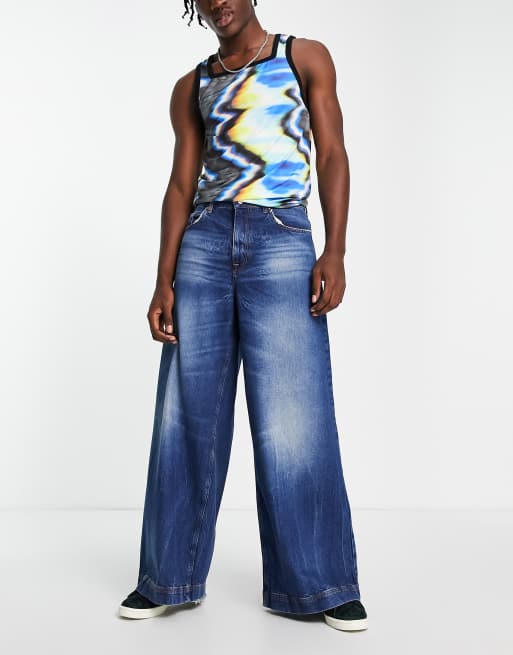 ASOS DESIGN – Niebieskie jeansy z bardzo szerokimi nogawkami i przebarwieniami