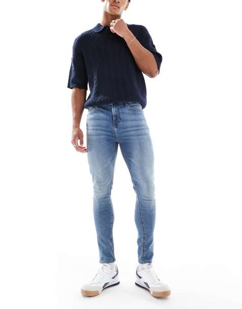ASOS DESIGN power stretch jeans in mid wash blue