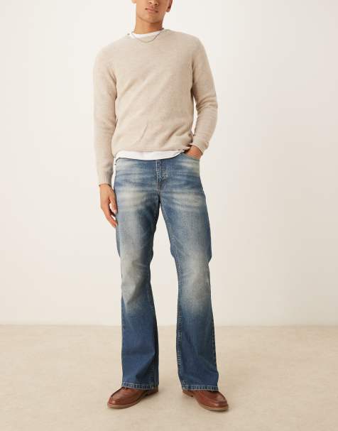 ASOS DESIGN – Niebieskie jeansy z rozszerzanymi nogawkami i przebarwieniami - view 1