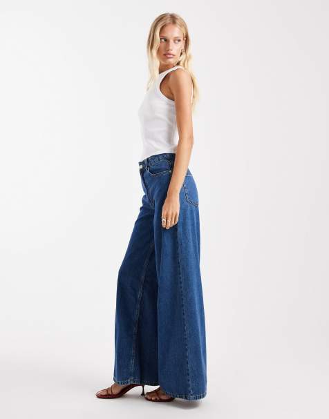 ASOS DESIGN high waist wide leg jeans in midwash blue