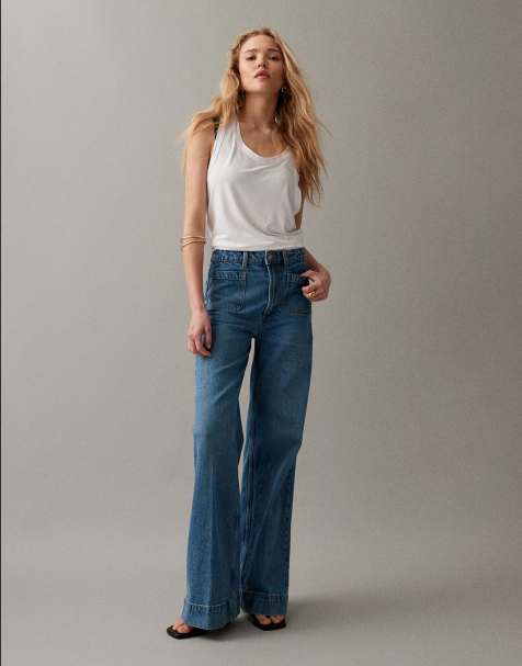 ASOS DESIGN high waist wide leg jeans with front pockets in midwash