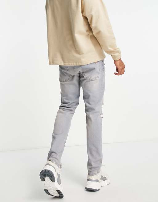 ASOS DESIGN – Niebieskie jeansy ze stretchem, z rozdarciami, 2 z 4