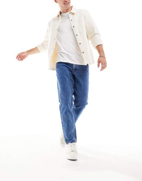 ASOS DESIGN tapered fit jeans in mid wash blue 