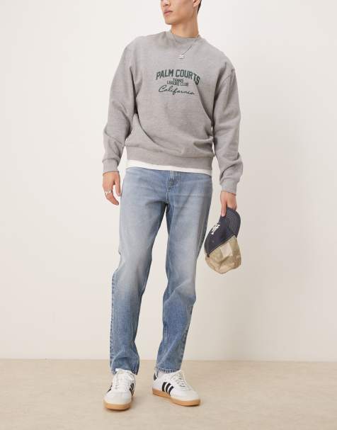 ASOS DESIGN tapered jeans in mid wash blue