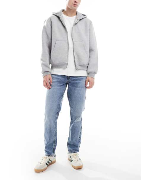 ASOS DESIGN tapered jeans in mid wash blue