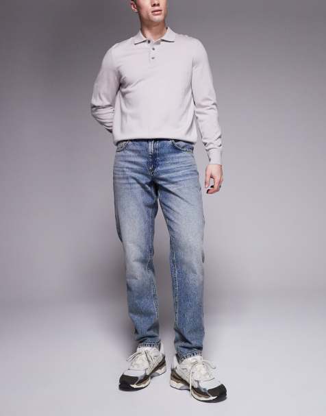 ASOS DESIGN tapered fit jeans in mid wash blue