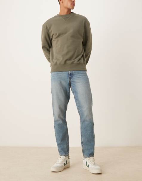 ASOS DESIGN tapered jeans in mid wash blue