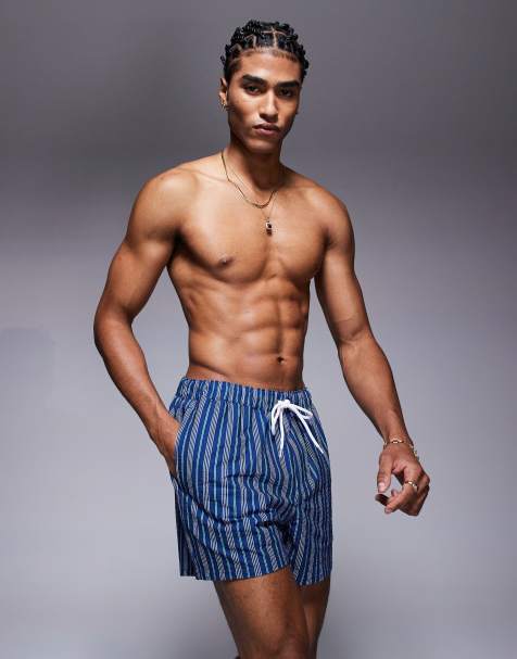 ASOS DESIGN swim shorts in short length with blue stripe