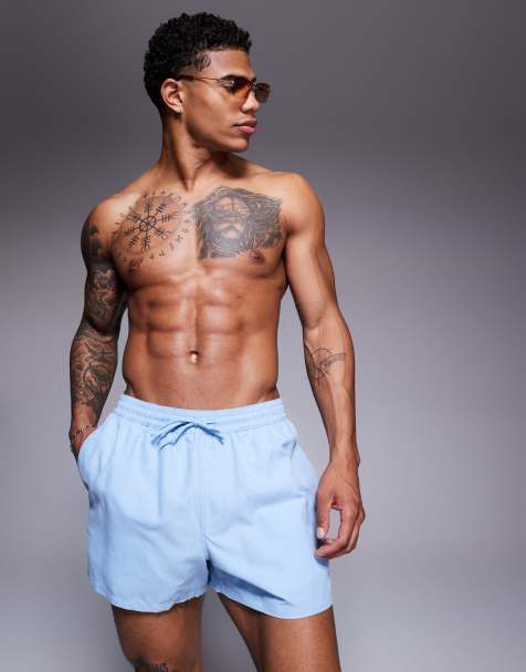 ASOS DESIGN swim shorts in short length in blue